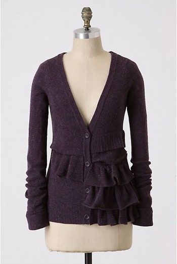 Kuva saattaa sisältää Clothing Apparel Sweater Cardigan Human and Person