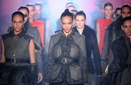 ในภาพอาจจะมี Shanina Shaik Joan Smalls Human Person Clothing Apparel Jacket Coat and Face
