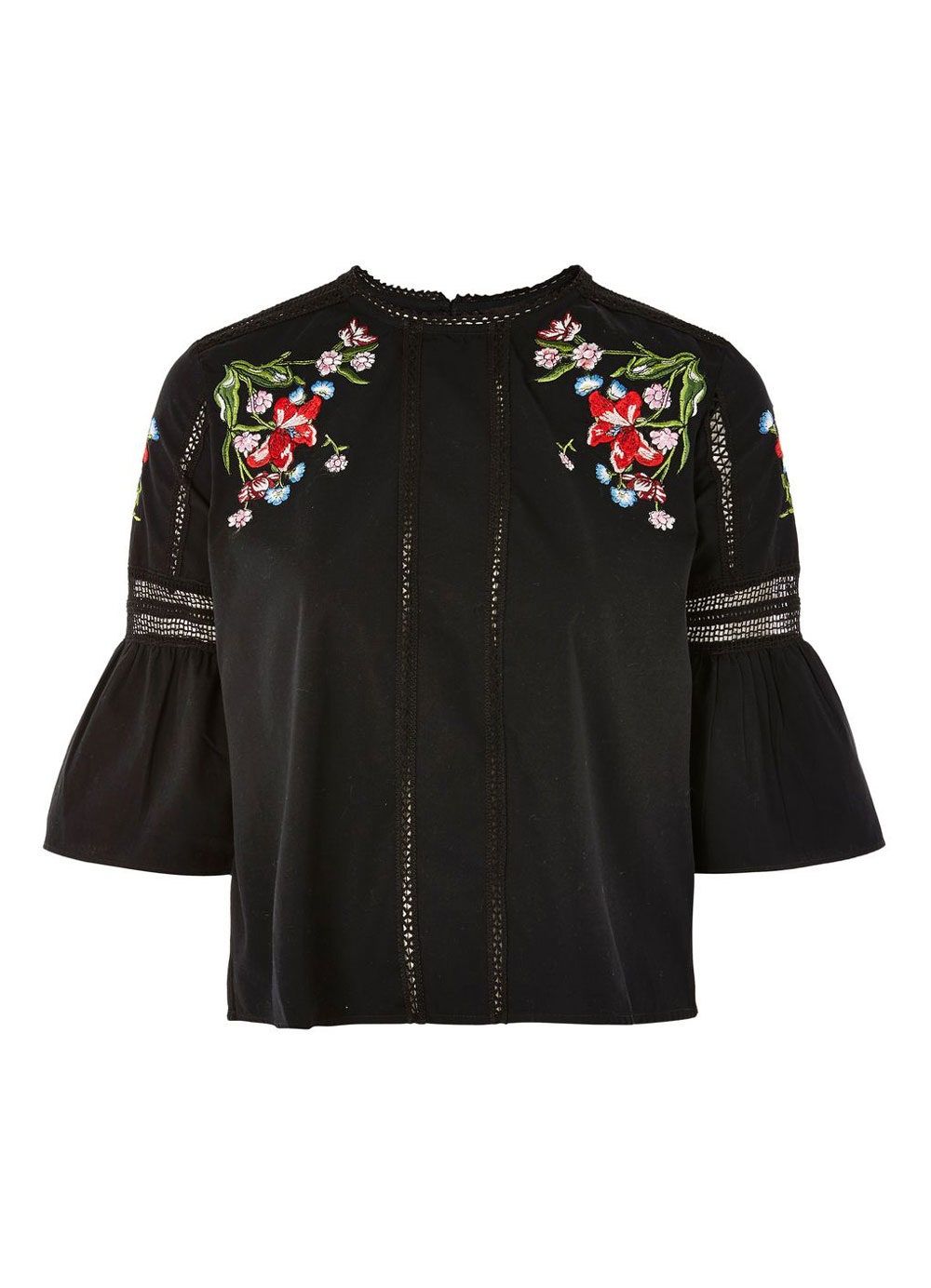 La imagen puede contener ropa, blusa, manga, manga larga, abrigo y chaqueta