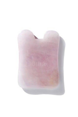 Bilden kan innehålla Cushion Pillow Soap Drink Milk and Beverage