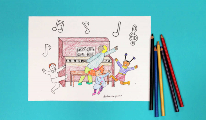   Dibujo para colorear de niños bailando alrededor del piano, junto a lápices de colores.