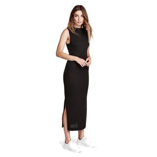 La imagen puede contener Andreea Diaconu Ropa Vestido Ropa Mujer Persona humana Mujer Vestido de noche Vestido y bata