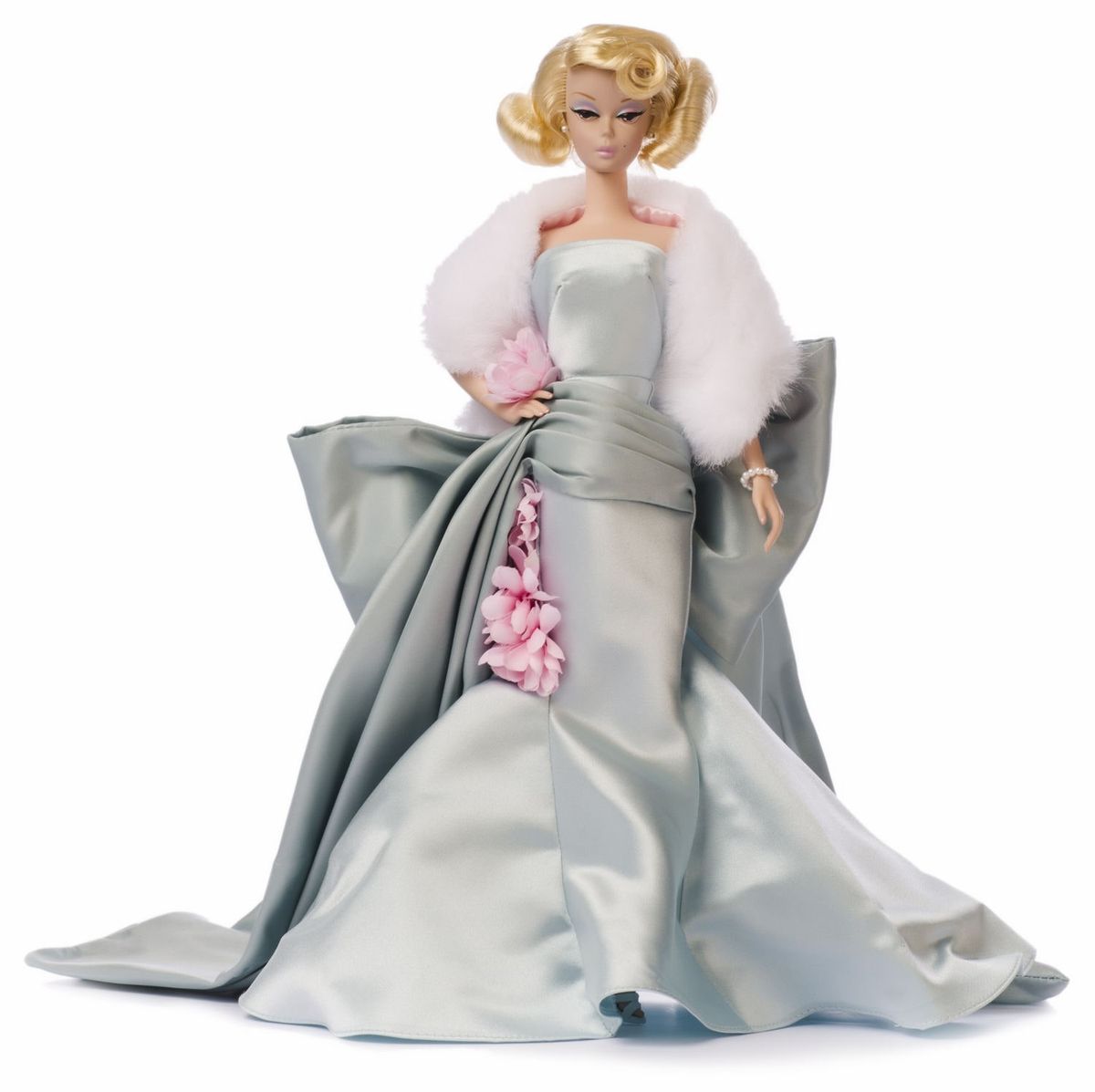 La imagen puede contener una figura de muñeca de juguete Barbie humana y persona