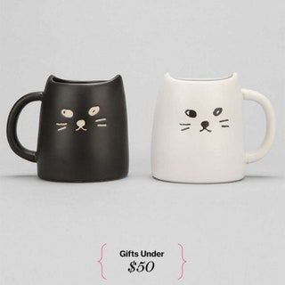 La imagen puede contener Taza de café Taza Electrónica Hardware del ratón Jarra de computadora Arte Cerámica y porcelana