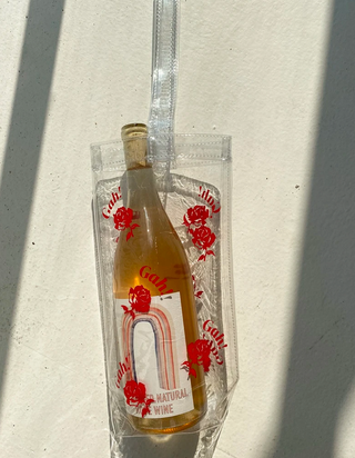 Slika lahko vsebuje Steklenica pijače Pop Steklenica in pijača