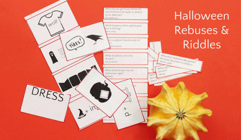   Acertijos de papel y acertijos junto a una calabaza amarilla con un texto que dice:"Halloween Rebuses & Riddles".