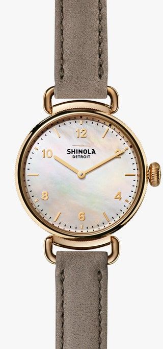 La imagen puede contener la arquitectura de la torre del edificio del reloj de pulsera y la torre del reloj