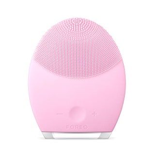 Esta imagen puede contener cinta y altavoz de audio de altavoz electrónico