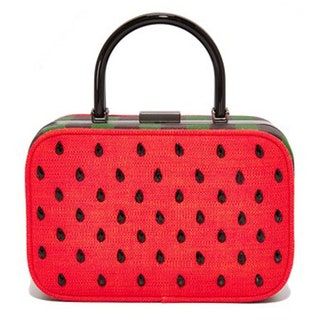 Esta imagen puede contener la textura y el monedero del bolso de accesorios del bolso de los accesorios