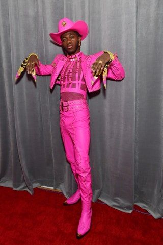Slika lahko vsebuje Lil Nas X Clothing Hat Apparel Fashion Human Person Stage in Premiere