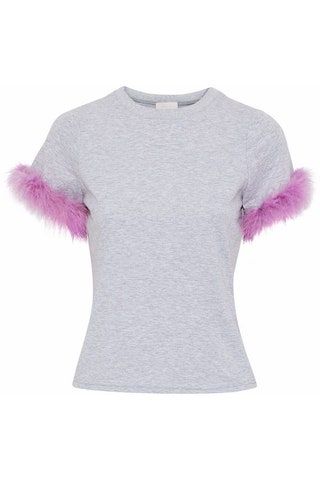 Slika lahko vsebuje Oblačila Oblačila z dolgimi rokavi in ​​TShirt