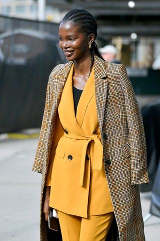 La imagen puede contener Ropa Abrigo Abrigo Persona humana Abrigo y gabardina