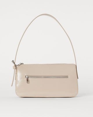 La imagen puede contener bolso, accesorios, bolso y monedero