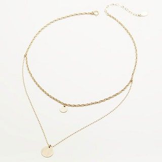 La imagen puede contener accesorios y accesorios de joyería de collar
