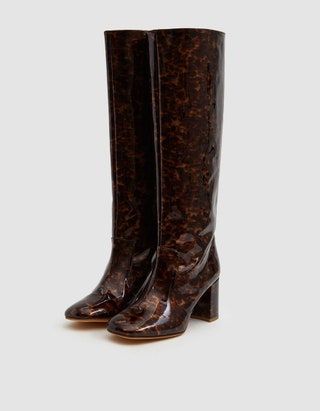 La imagen puede contener Ropa Vestimenta Calzado Bota de montar Bota Zapato y tacón alto