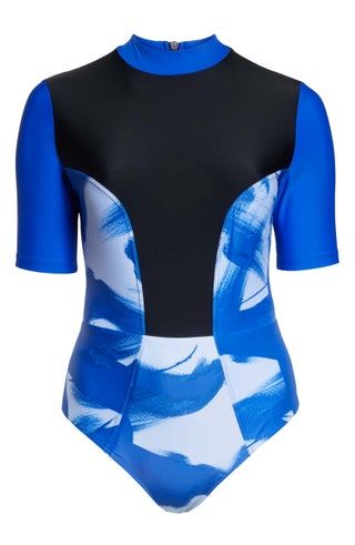La imagen puede contener ropa, ropa, camisa y licra.