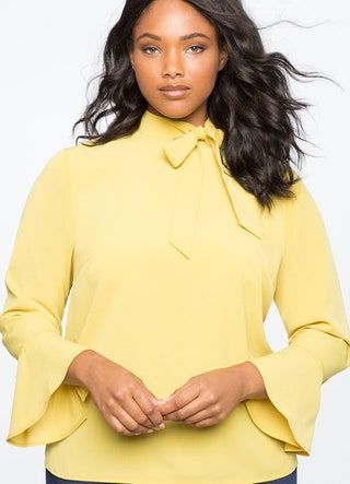 La imagen puede contener Ropa Ropa Blusa Abrigo Persona humana y Mujer