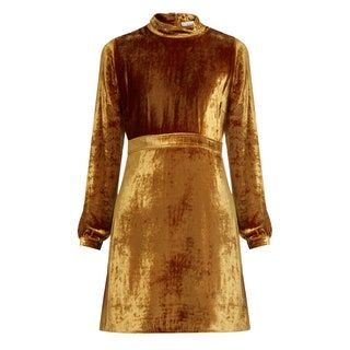 La imagen puede contener ropa, ropa, vestido, manga, abrigo, abrigo y manga larga