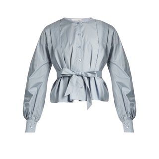La imagen puede contener ropa, ropa, blusa, abrigo, manga y manga larga