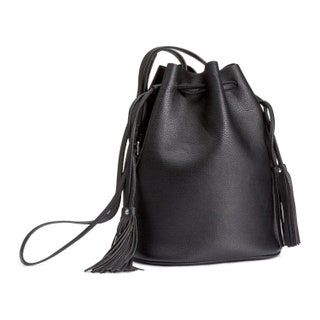 La imagen puede contener Accesorios de bolso Bolso de accesorios Monedero y mochila