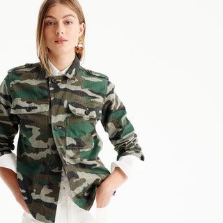 La imagen puede contener uniformes militares militares, persona humana y camuflaje.