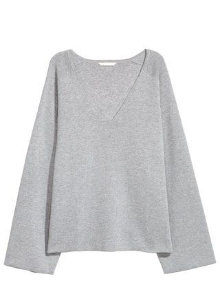 La imagen puede contener ropa Suéter de manga larga y sudadera