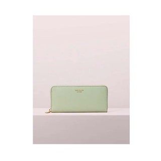cartera grande verde claro con cremallera dorada y Kate Spade