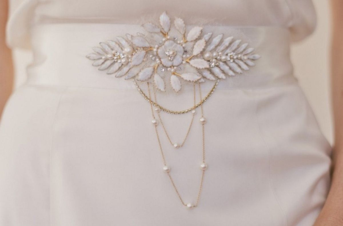 La imagen puede contener accesorios y accesorios de joyería de collar