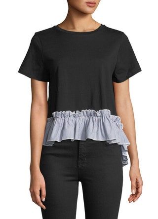 La imagen puede contener ropa, ropa, pantalones cortos, persona humana, manga, blusa y camiseta