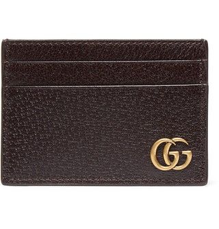 Esta imagen puede contener Accesorios Cartera de accesorios y alfombra