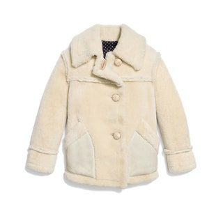 La imagen puede contener ropa Abrigo Abrigo y chaqueta
