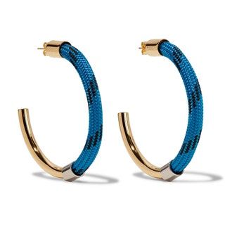La imagen puede contener brazalete, accesorios, accesorios y pulsera.