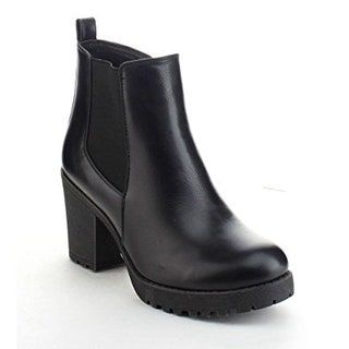 Esta imagen puede contener ropa, calzado y botas.