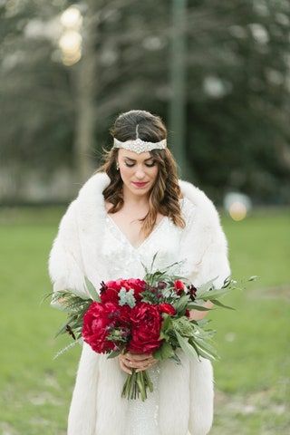 La imagen puede contener Planta Persona humana Flor Ramo de flores Flor Arreglo floral Ropa y prendas de vestir