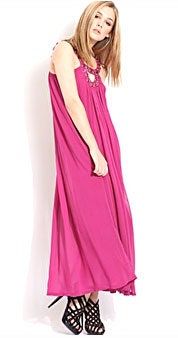Esta imagen puede contener Vestido Ropa Ropa Persona femenina humana Mujer Vestido de noche Vestido de moda y bata