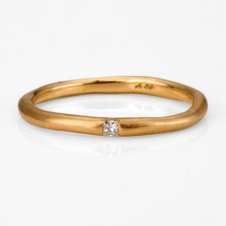 La imagen puede contener accesorios de joyería, accesorio y anillo