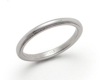 La imagen puede contener accesorios de joyería Accesorio de anillo de platino y plata